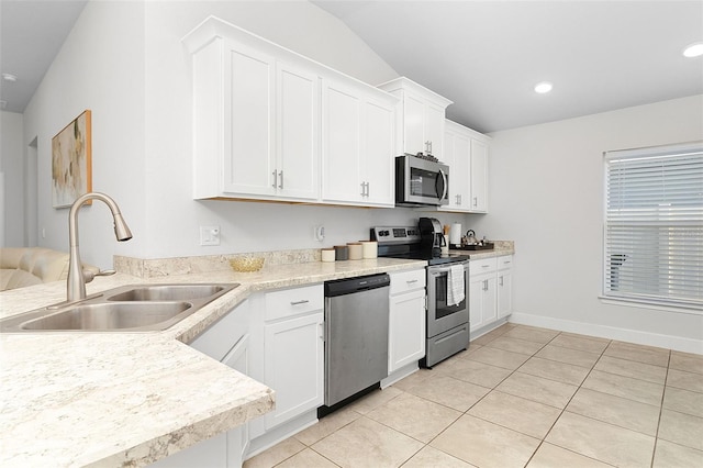 kitchen featuring white cabinetry, sink, and appliances with stainless steel finishes