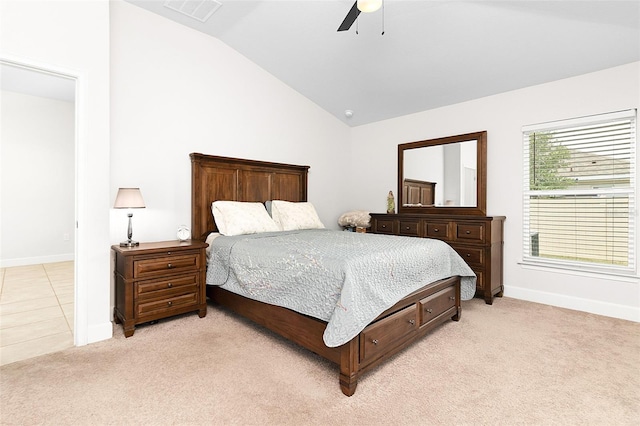 carpeted bedroom featuring ceiling fan and lofted ceiling