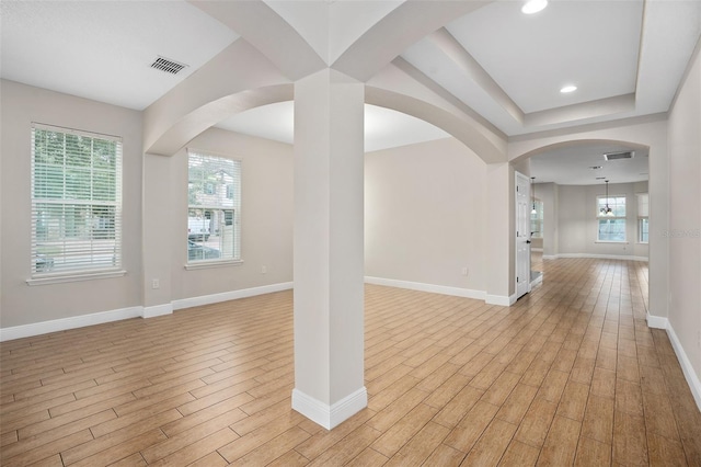 interior space featuring a healthy amount of sunlight and light hardwood / wood-style flooring