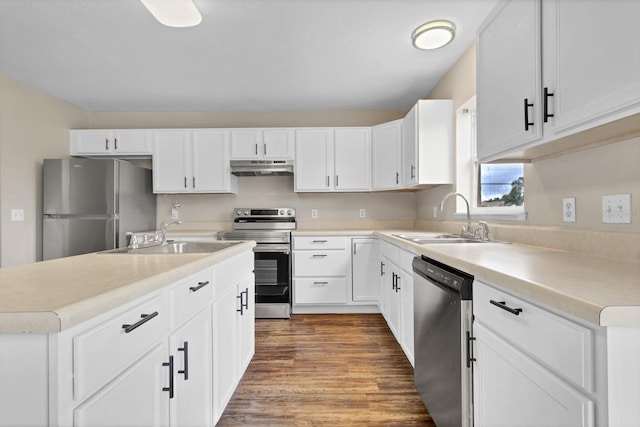 kitchen with white cabinetry, sink, and appliances with stainless steel finishes