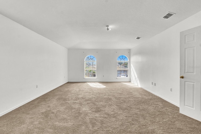 unfurnished living room featuring carpet floors