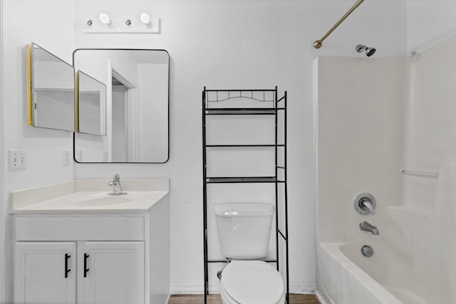 full bathroom featuring vanity, toilet, and tub / shower combination