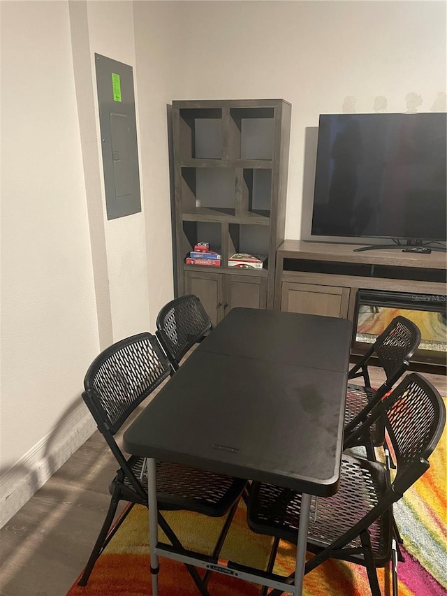 dining room featuring electric panel