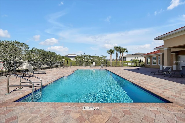 view of pool with a patio