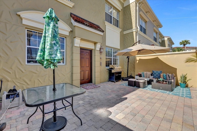 view of patio / terrace featuring grilling area and an outdoor hangout area