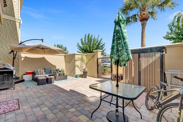 view of patio / terrace with area for grilling and an outdoor hangout area