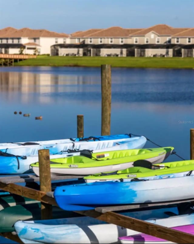 view of dock with a water view