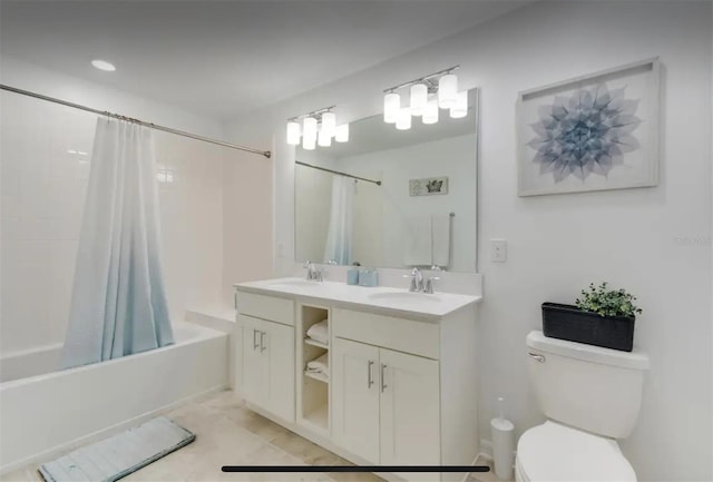 full bathroom featuring shower / bath combination with curtain, vanity, and toilet