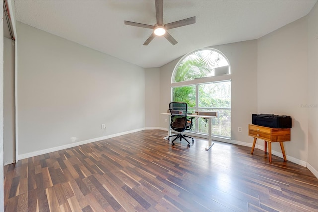 unfurnished office featuring dark hardwood / wood-style flooring and ceiling fan