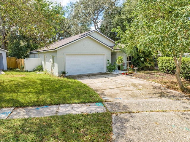 view of front of property with a front lawn and a garage