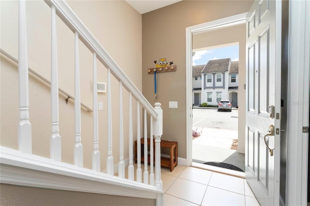 view of tiled foyer entrance