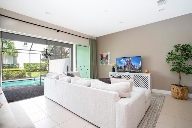 living room featuring light tile patterned flooring