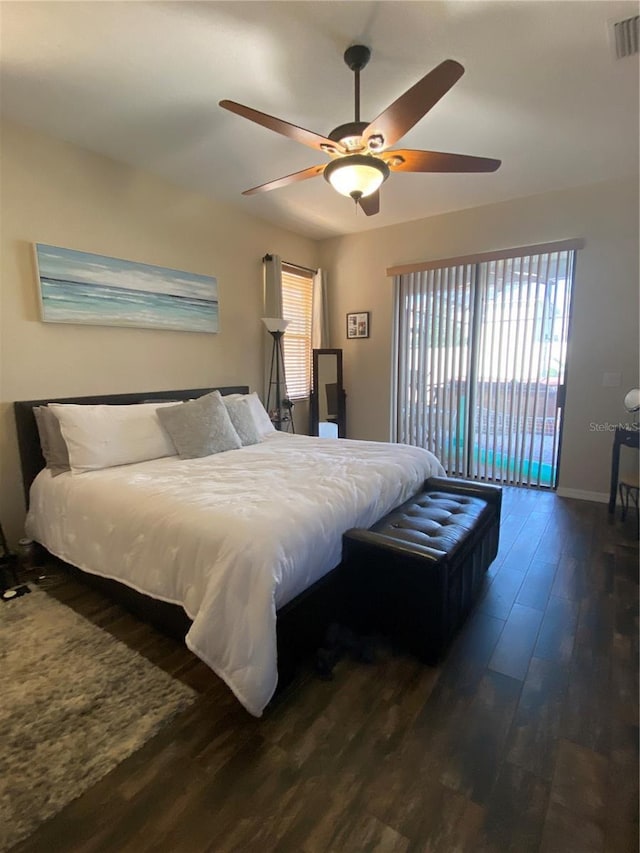 bedroom with ceiling fan, access to exterior, and dark wood-type flooring