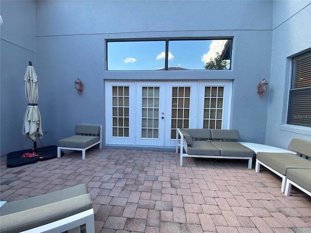 view of patio featuring french doors