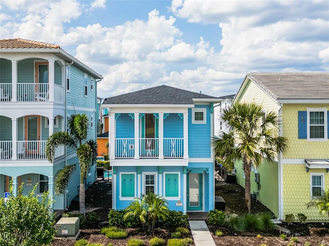 coastal home featuring a balcony