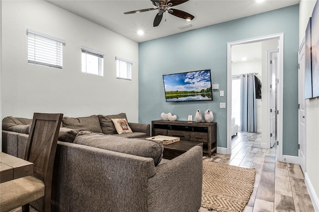 living room with ceiling fan