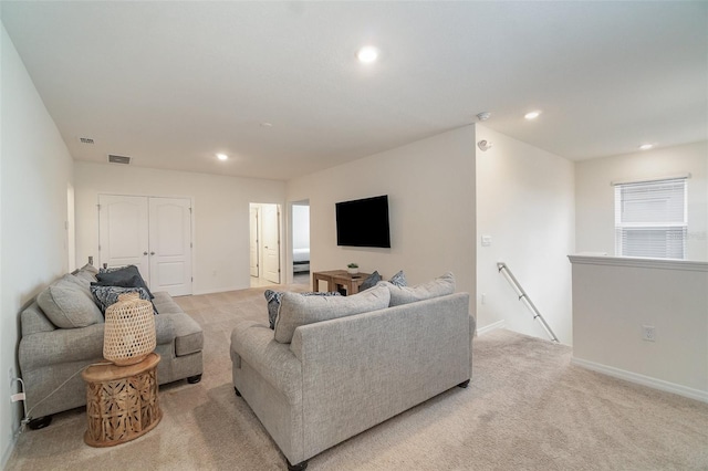 living room with light colored carpet