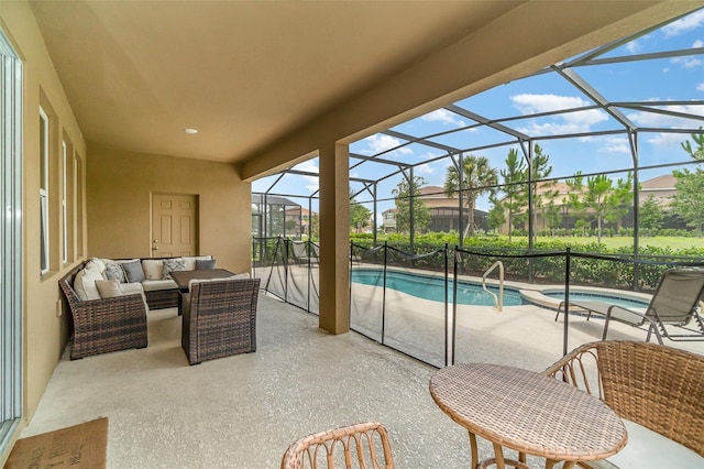 exterior space with a jacuzzi, an outdoor living space, a patio area, and a lanai