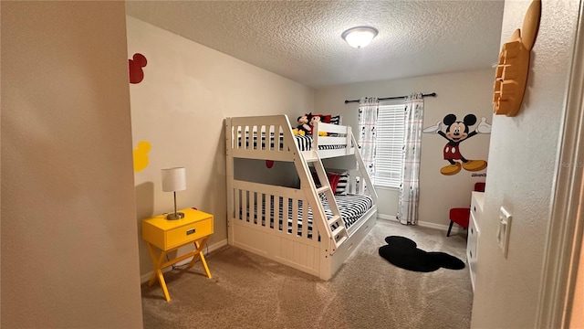 bedroom with carpet flooring and a textured ceiling