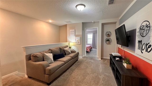 living room with carpet and a textured ceiling