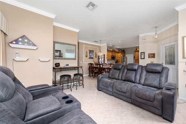 living room featuring ornamental molding and light tile patterned floors