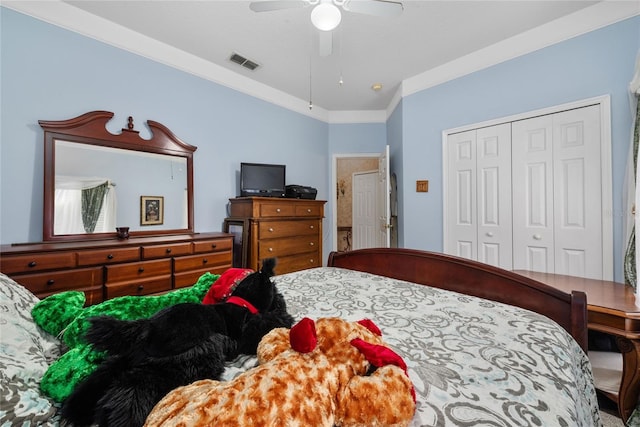 bedroom with a closet, ceiling fan, and crown molding