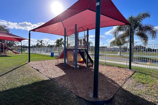 view of playground with a yard