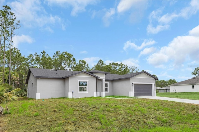 view of front facade featuring driveway, a front lawn, an attached garage, and stucco siding