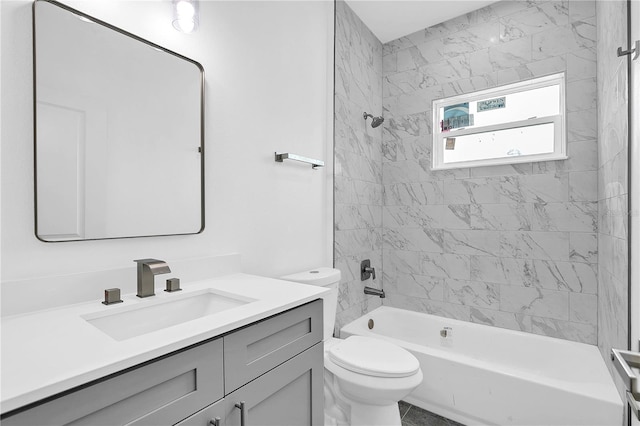 full bath featuring toilet, washtub / shower combination, and vanity