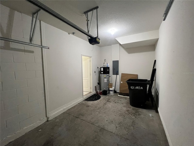 garage with electric panel, a garage door opener, and water heater