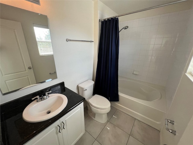 full bathroom featuring tile patterned floors, vanity, shower / bathtub combination with curtain, and toilet