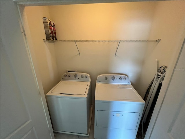 laundry room with washer and clothes dryer