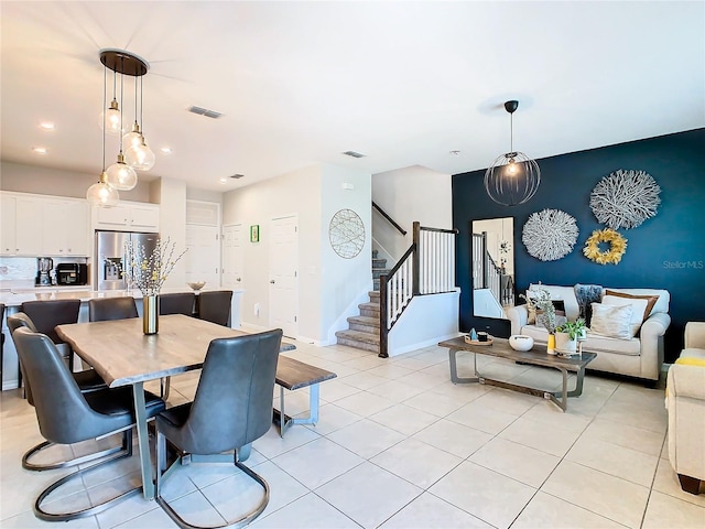 view of tiled dining space