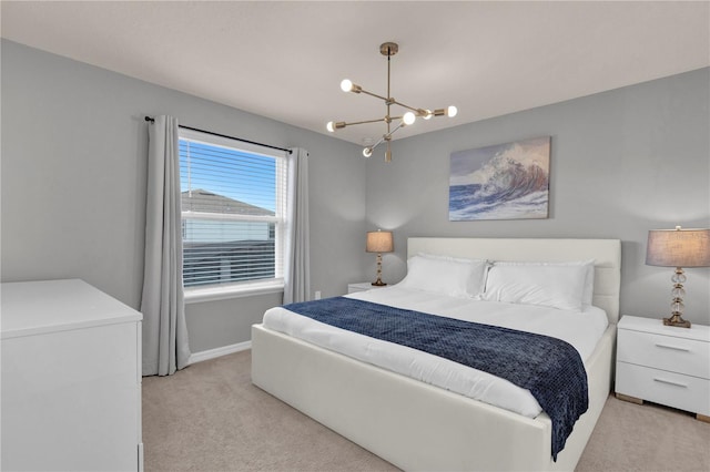 bedroom with light carpet and a chandelier