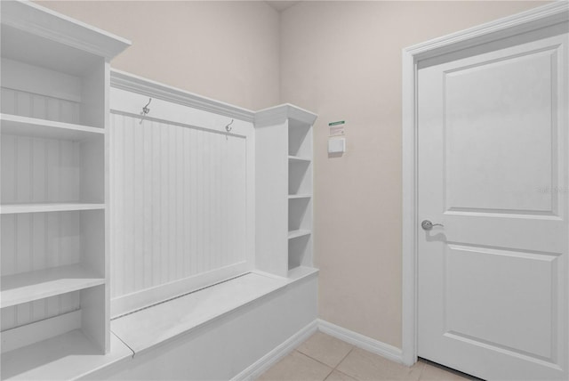 walk in closet featuring light tile patterned floors