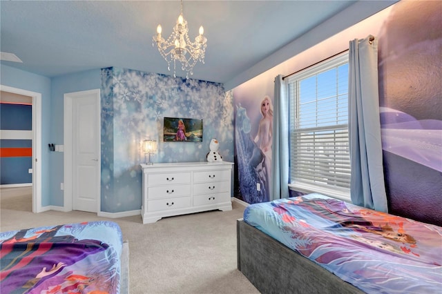 carpeted bedroom featuring a notable chandelier