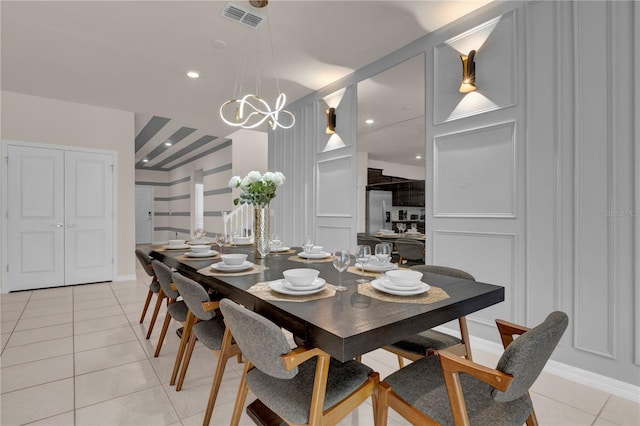 dining space with light tile patterned floors