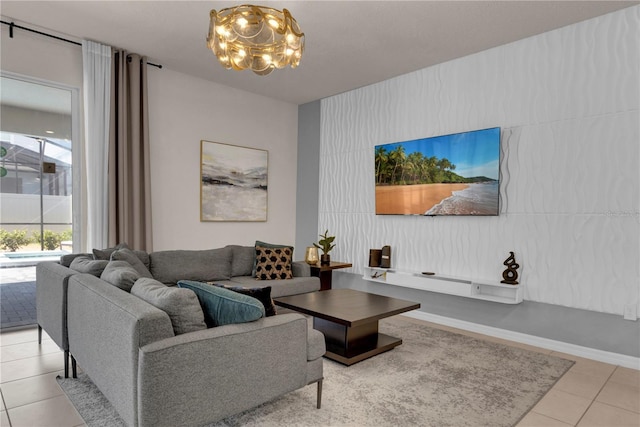 tiled living room featuring a notable chandelier