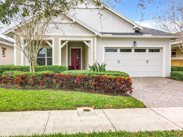 view of front of property with a garage