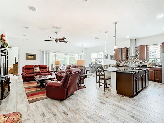 living room with a healthy amount of sunlight and light wood-type flooring