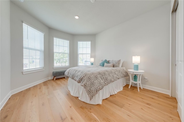 bedroom featuring hardwood / wood-style floors