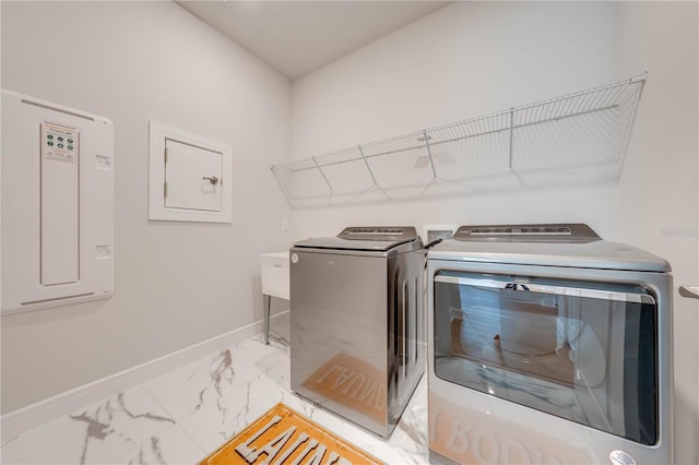 laundry room featuring washing machine and dryer