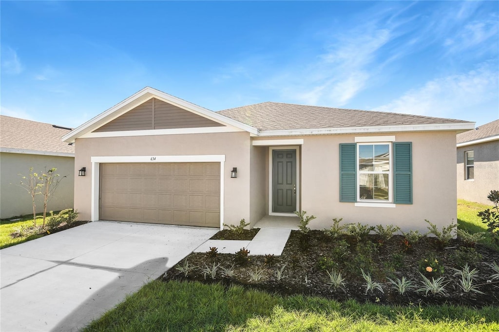 ranch-style home with a garage