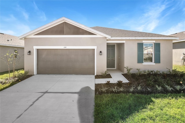 ranch-style house featuring a garage