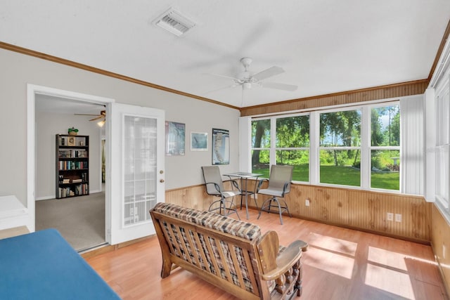 sunroom / solarium with ceiling fan