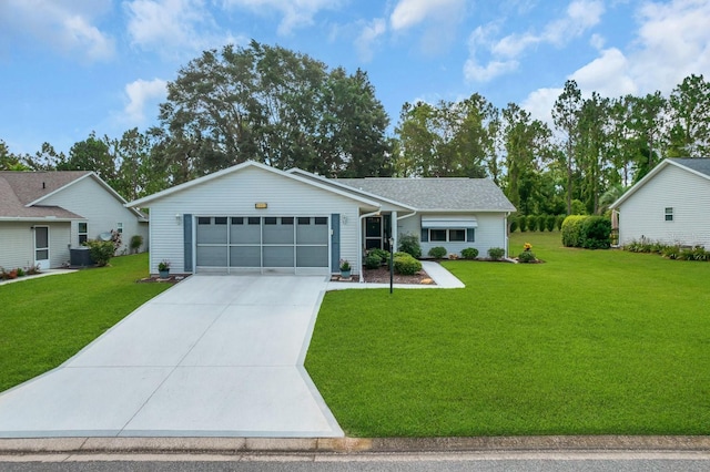 ranch-style home with a front yard, a garage, and central AC unit