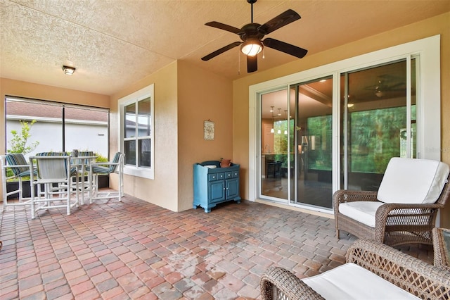 view of patio with ceiling fan