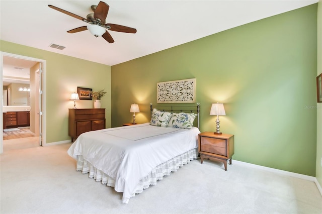 bedroom featuring ceiling fan, carpet floors, and connected bathroom