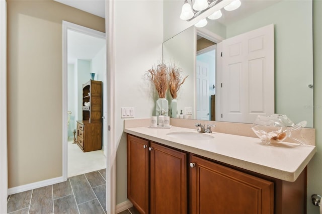 bathroom featuring vanity and wood-type flooring