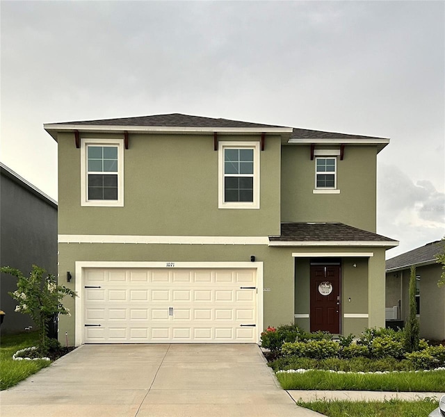 view of front of house with a garage